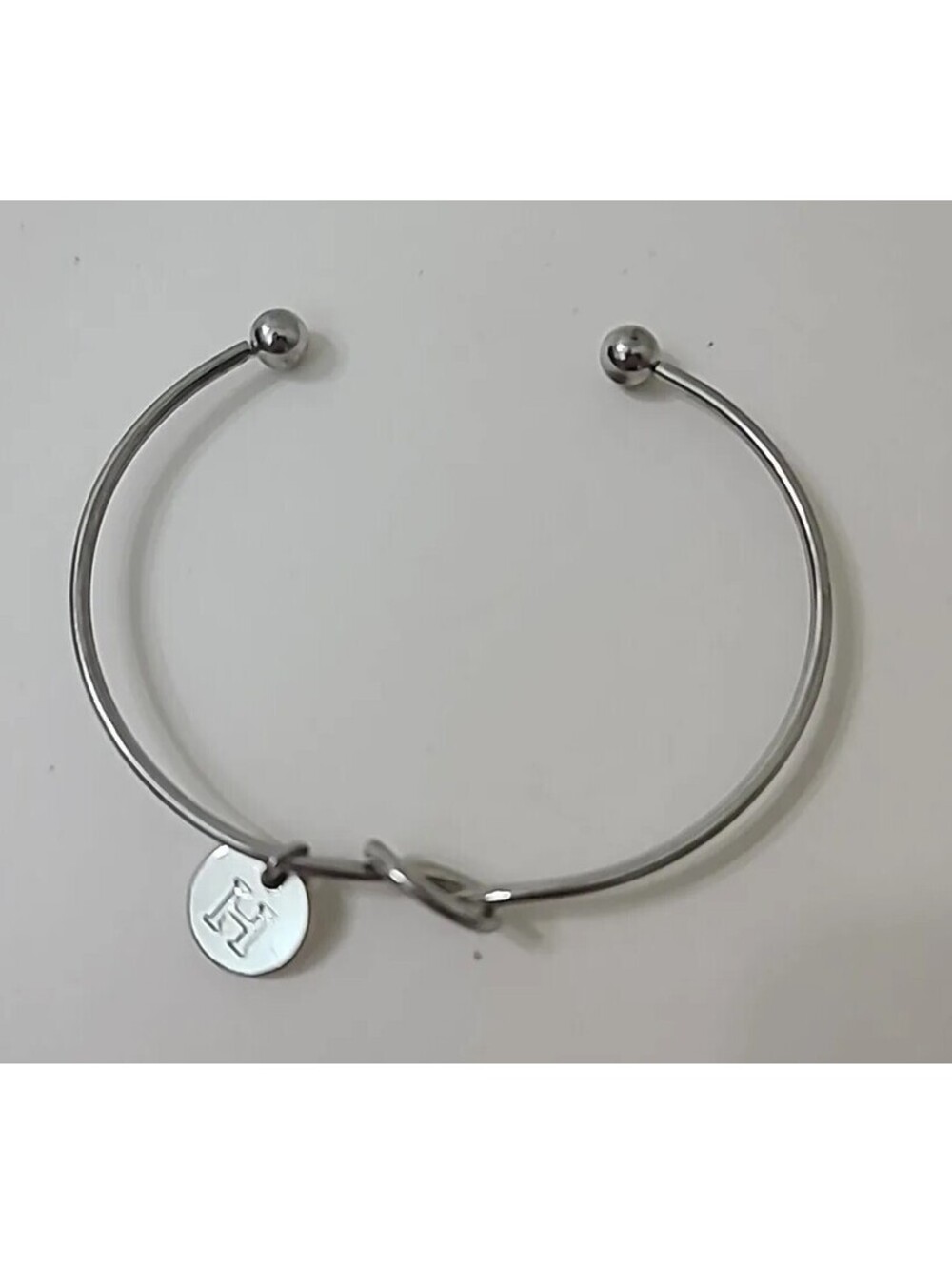 Knot Silvertone Wire Bangle Bracelet Adjustable with H Initial Dangle